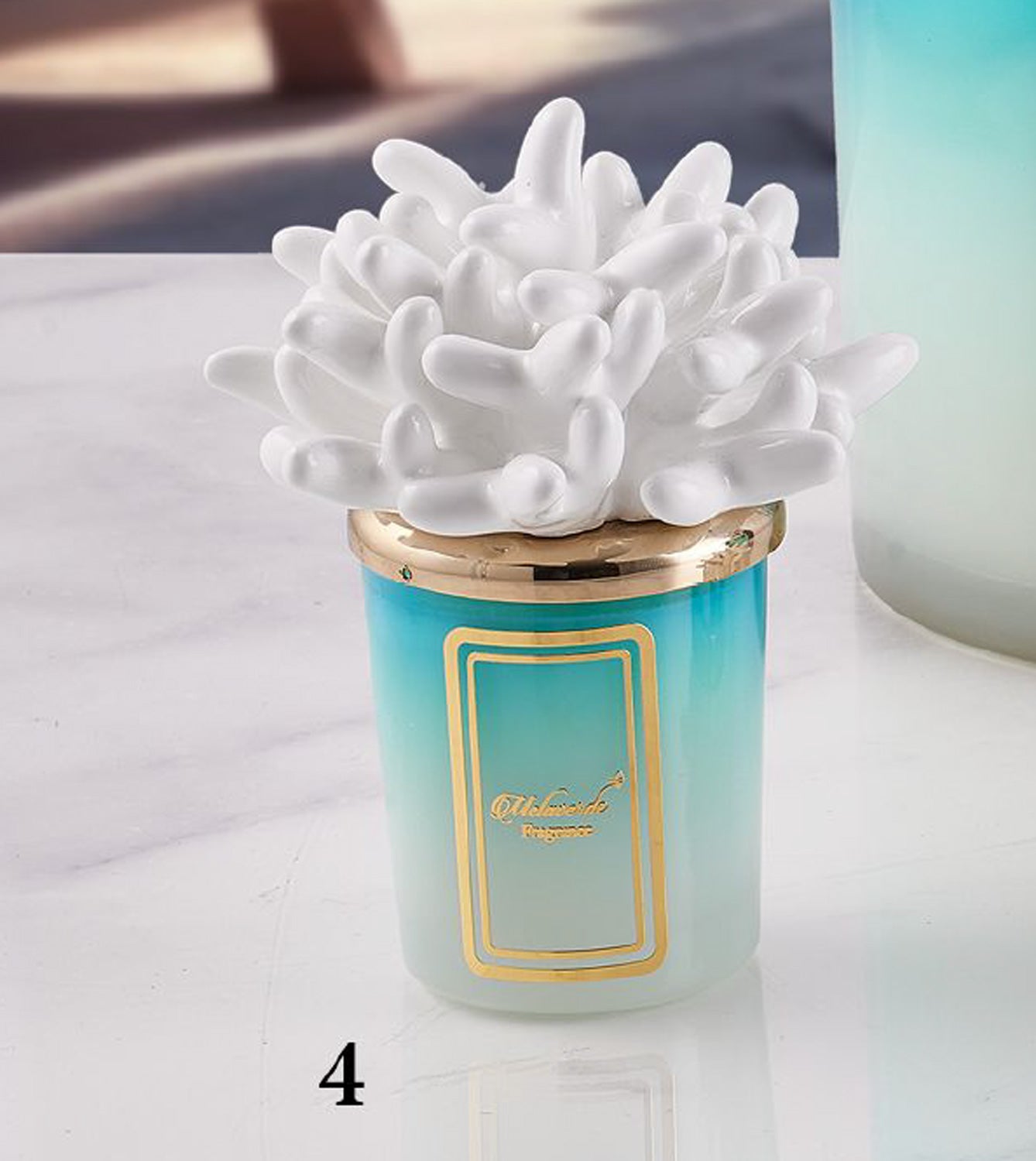 Candela piccola in ceramica bicolore Melaverde Linea Tropicana da 100gr, anemone bianco, fatta a mano e completa di scatola regalo elegante.