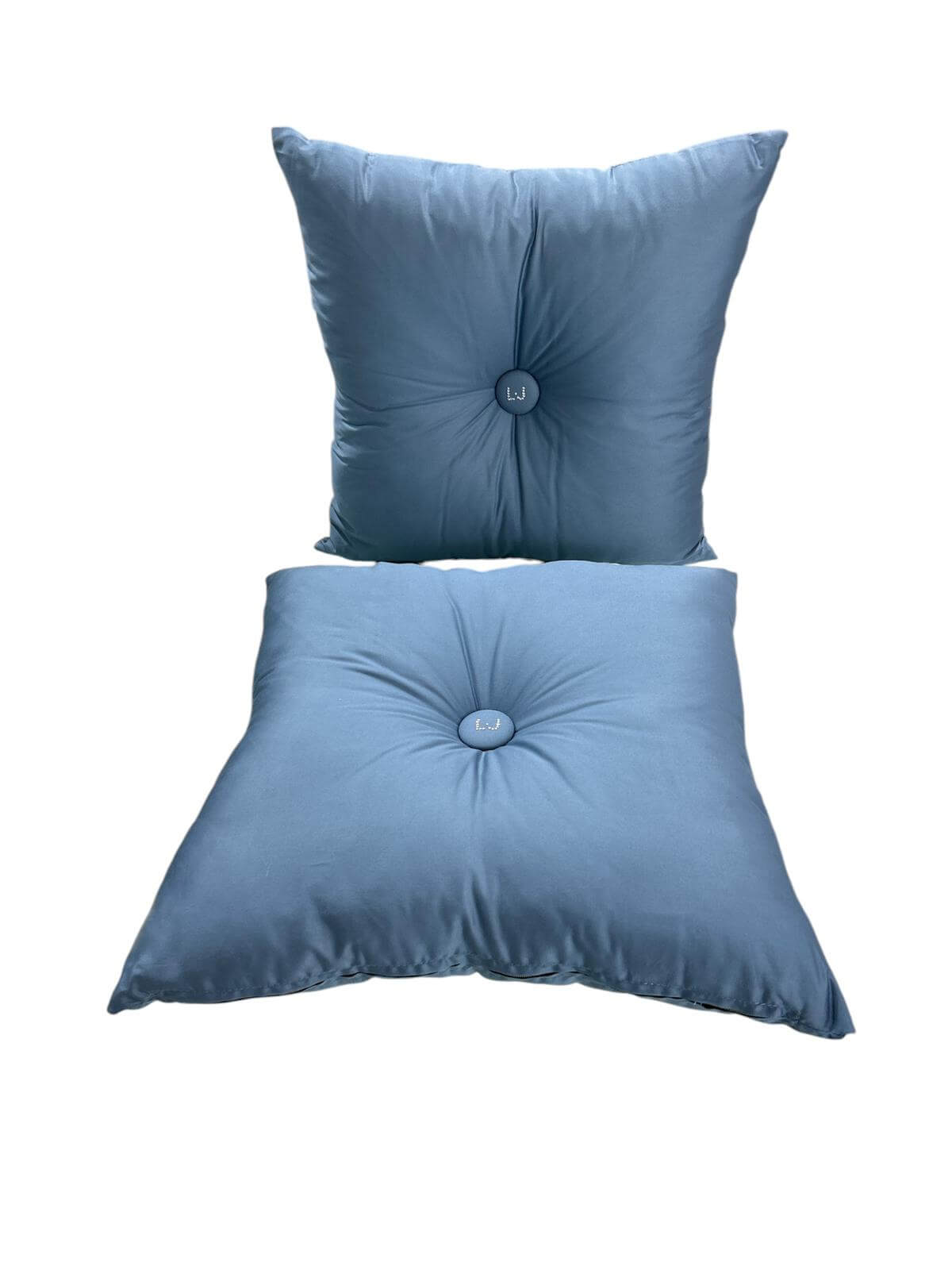 Cuscino arredo Liu Jo 40x40 cm in raso di cotone con bottone centrale decorativo, elegante e Made in Italy.