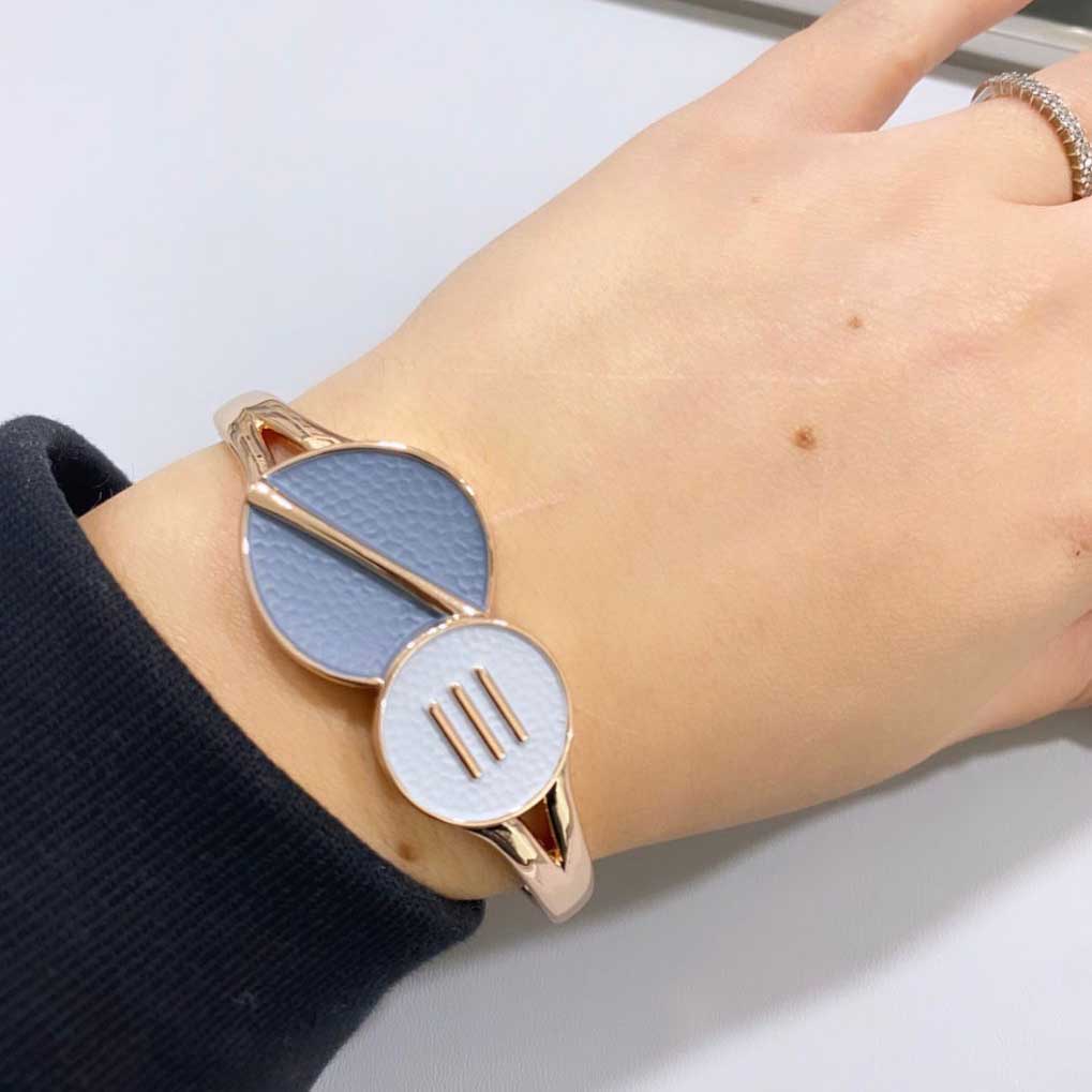 Bracciale Orbital Cosmo Alexarte artigianale, con placcature in oro o argento, cristalli e confezione elegante