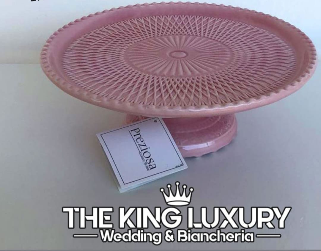 Alzatina in porcellana rosa Ø24 cm con design elegante, perfetta per servire dolci e torte.