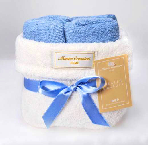 Set lavette Maestri Cotonieri 30x30 in spugna con cestino decorativo, accessorio bagno raffinato.