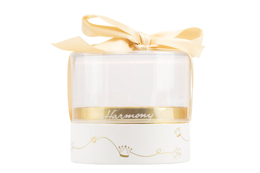 Profumatore bomboniera a forma di carrozza in porcellana bianca perlata Harmony, con strass, corona e cuore oro, cm 13x7x12h, con scatola regalo.